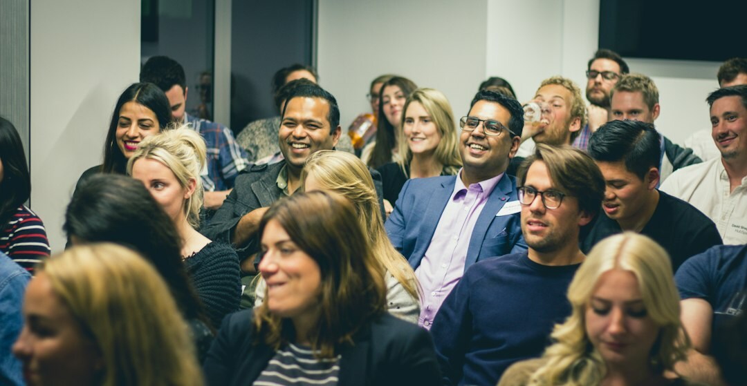 audience listening to speaker