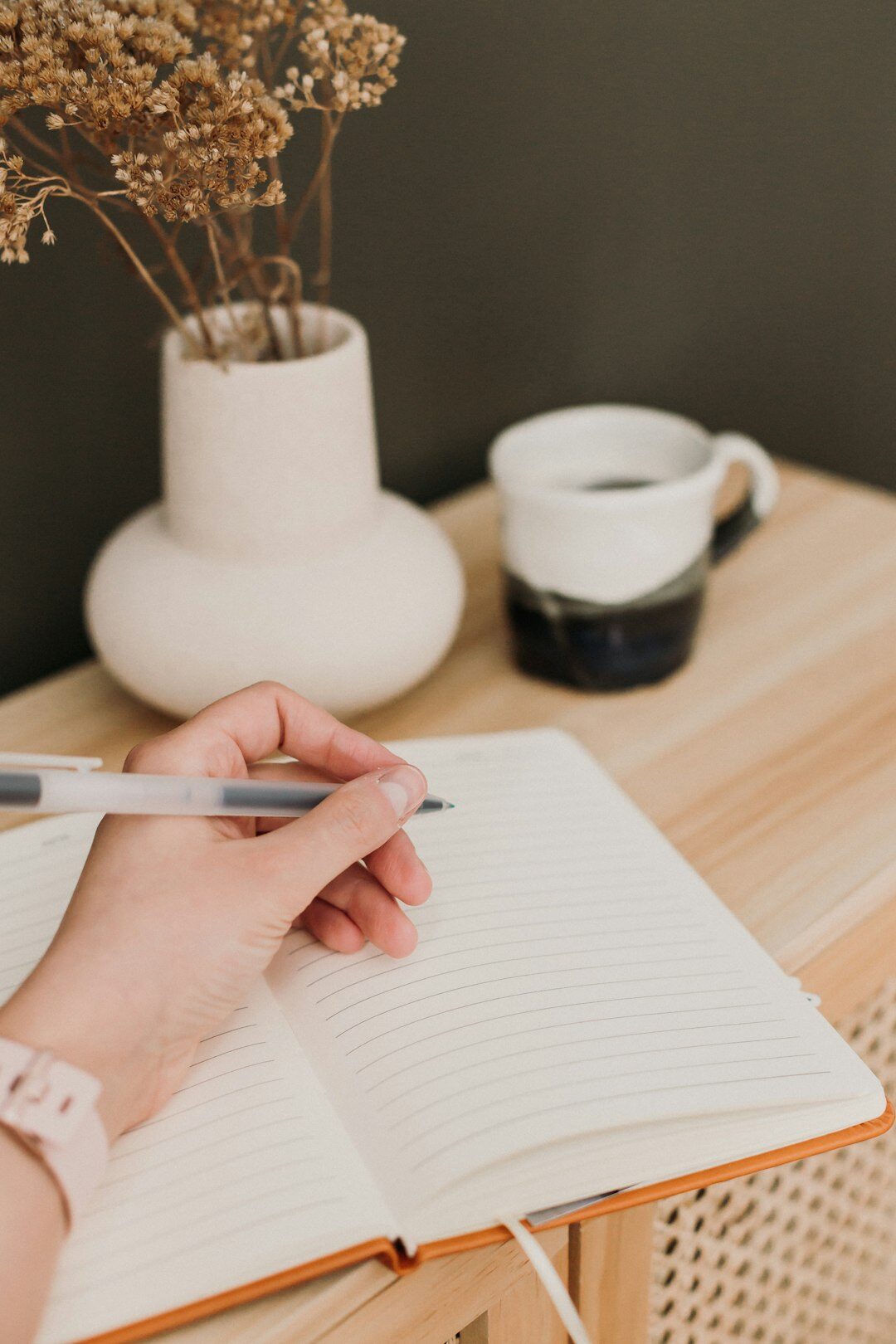 woman writing in journal