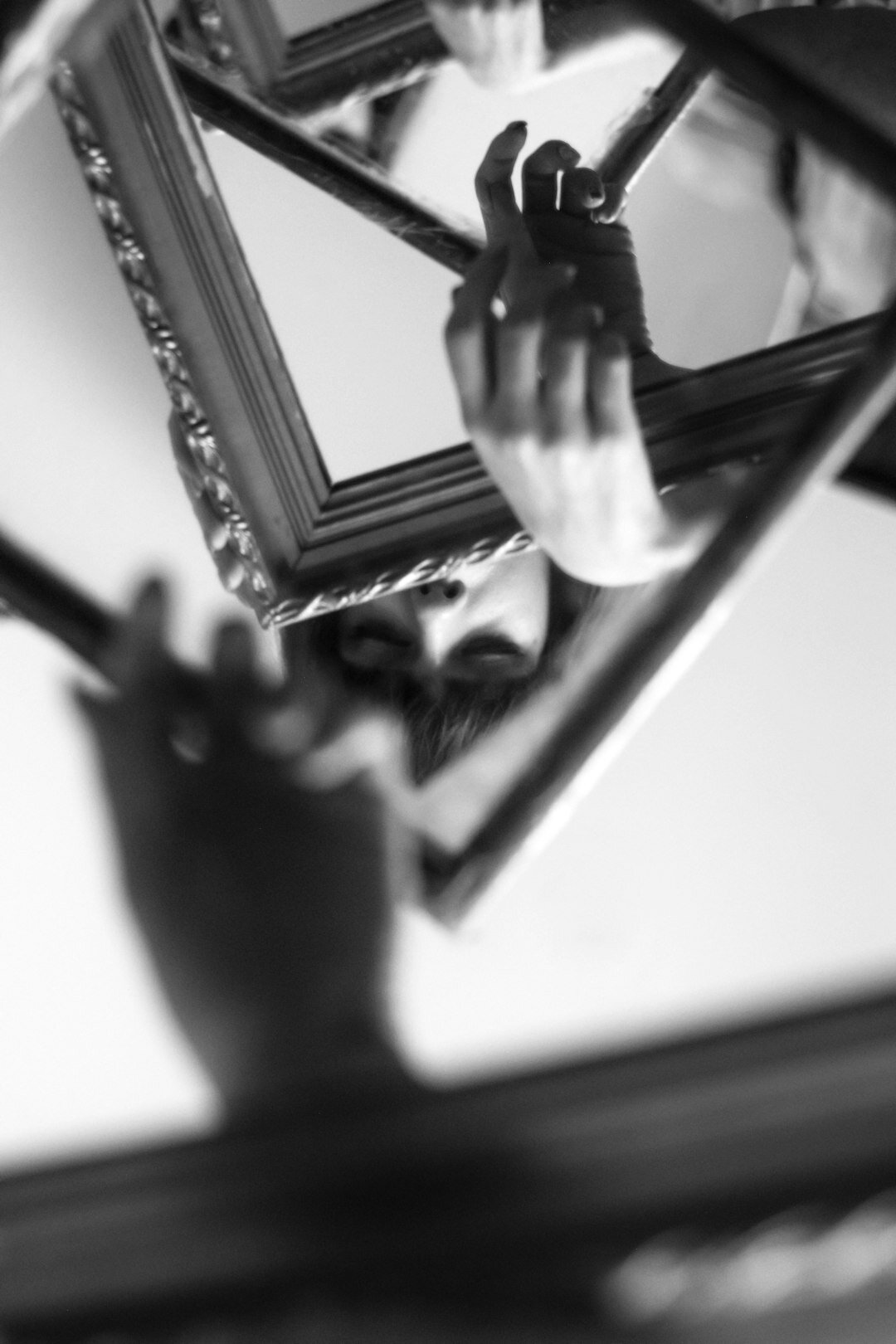 person reflecting in mirror