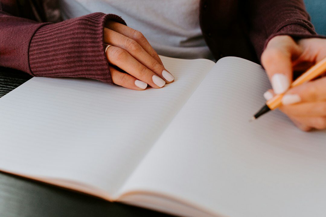 person journaling thoughts