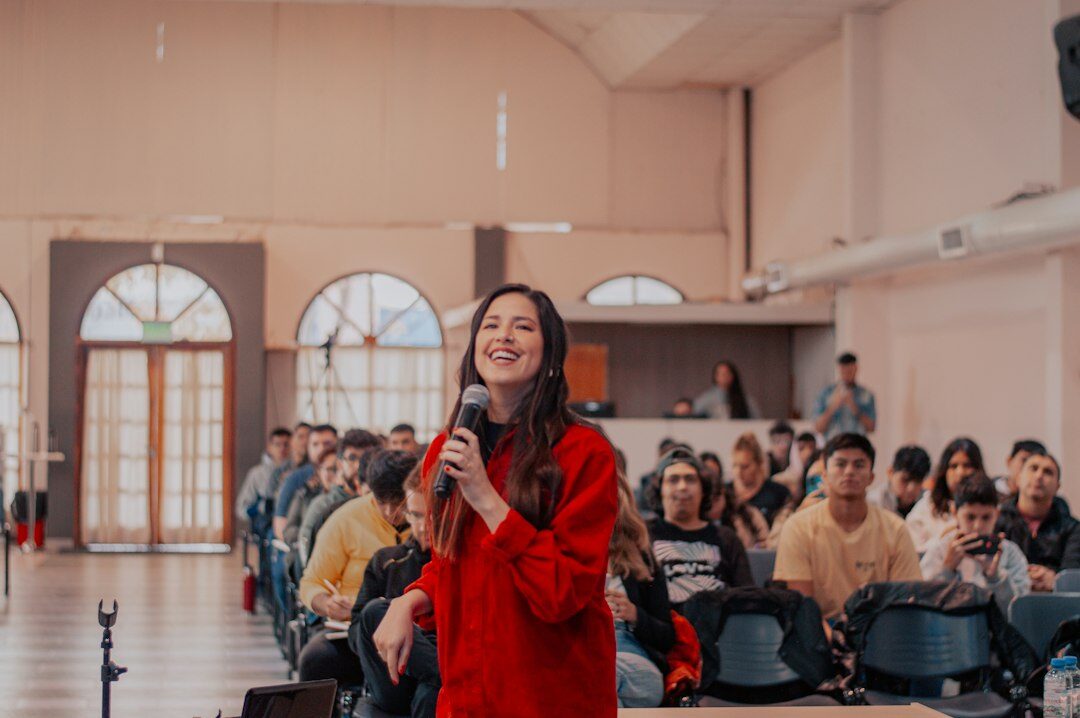 person speaking confidently in meeting