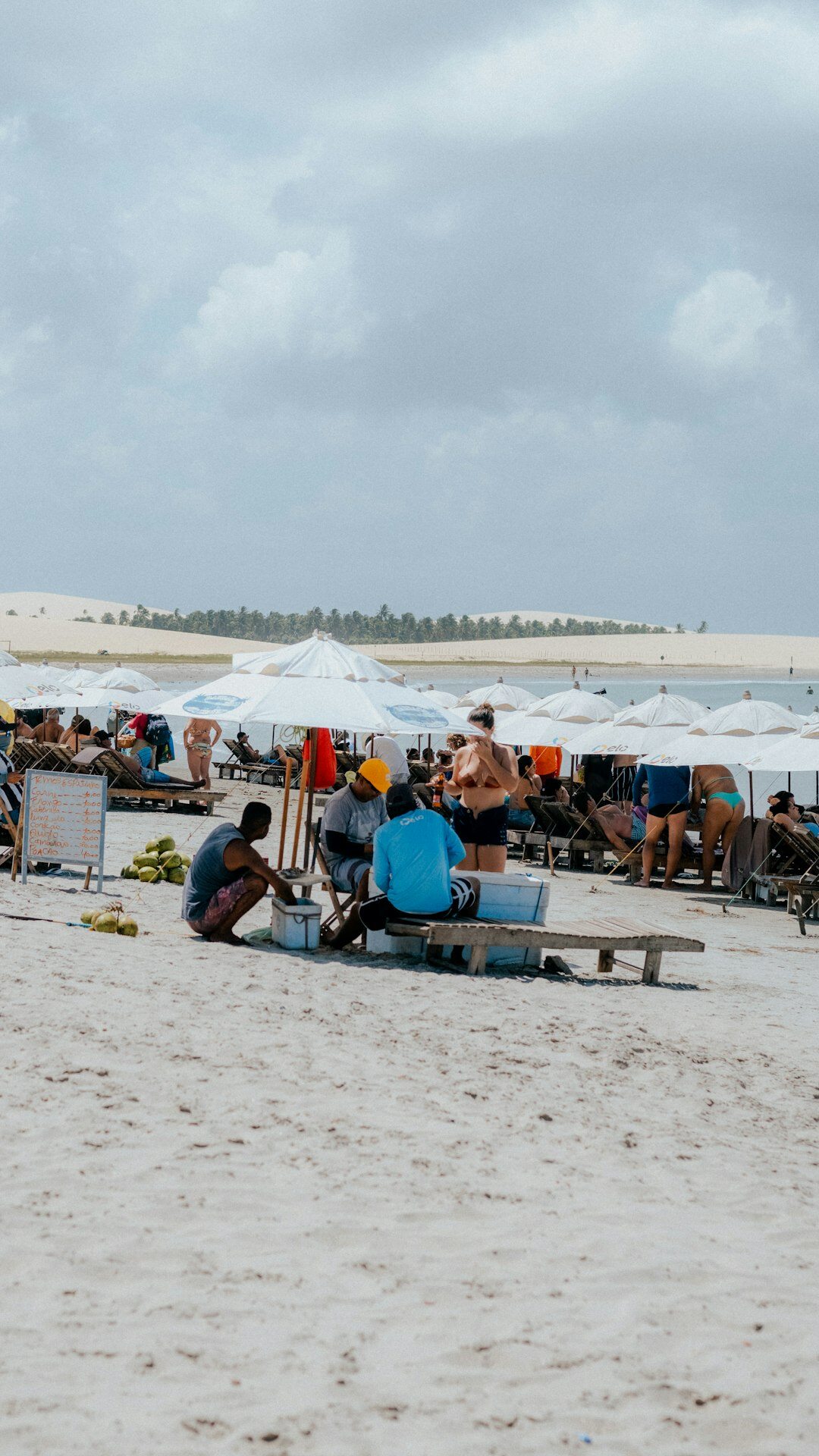 Group of diverse Brazilian adults sitting around a table having an open conversation